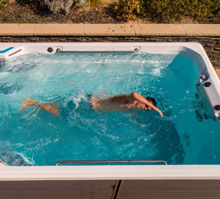Swim Spa or Swimming Pool? Which One Is Right for You? | Mainely Tubs