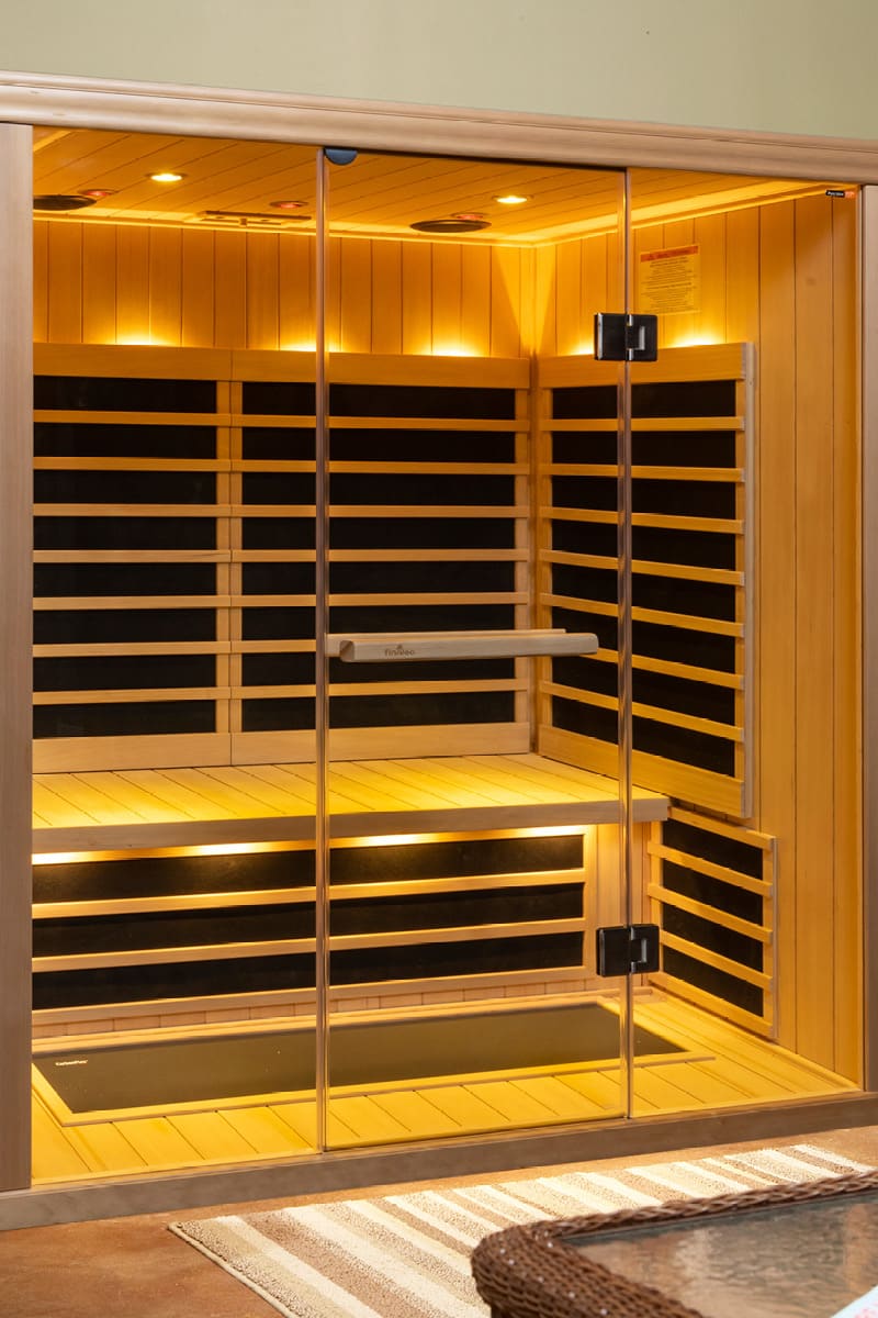 Home infrared Sauna with lights on.