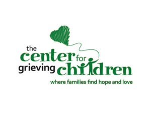 The Center for Grieving Children logo in green with a green heart floating on a string with two outlines of people holding it